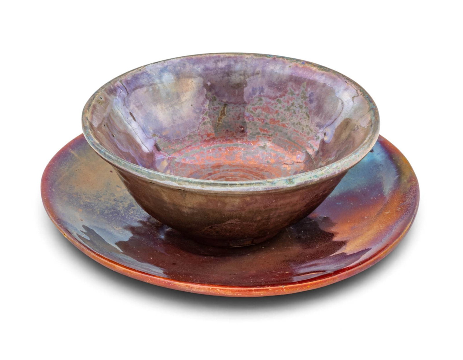 Pewabic Pottery (Detroit, Est. 1903) Iridescent Glazed Earthenware Bowl and Underplate 1940, 2 PCS: Pewabic Pottery (Detroit, Est. 1903) Iridescent Glazed Earthenware Bowl and Underplate 1940, 2 PCS Copper glaze on white clay with reduction. Plate undermarked with hand inscribed "Pewabic" Bowl havin
