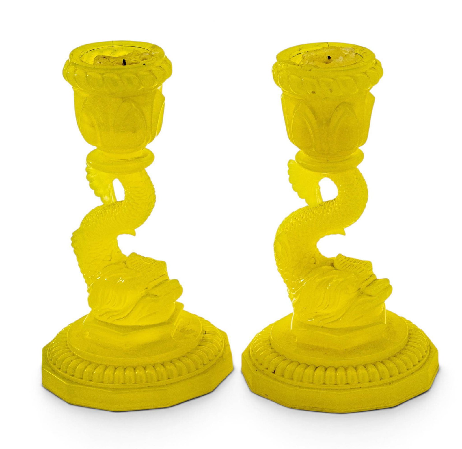 Portieux Vallerysthal (French, Est. 1836) Yellow Opaline Uranium Glass Dolphin Form Candlesticks: Portieux Vallerysthal (French, Est. 1836) Yellow Opaline Uranium Glass Dolphin Form Candlesticks 1870-1910, H 8.5" Dia. 4.5" octagonal bases support dolphins holding bobèche aloft with their ta