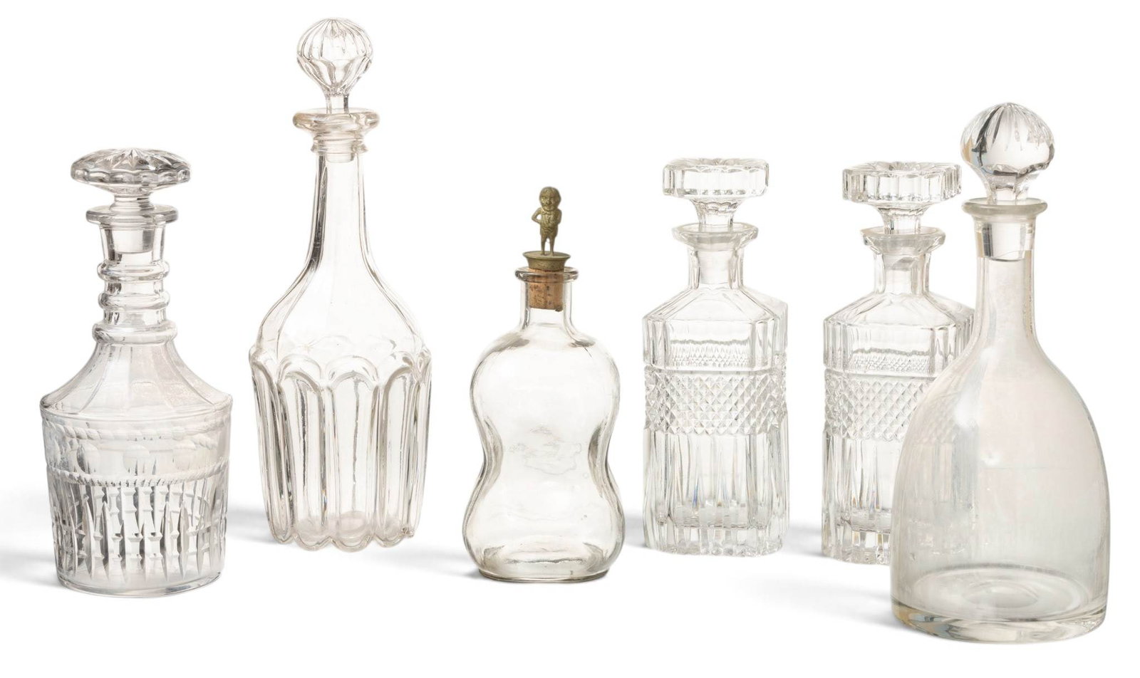 Continental European Cut Lead Crystal Whiskey and Wine Decanters 20th C., 6 PCS: Continental European Cut Lead Crystal Whiskey and Wine Decanters 20th C., 6 PCS Assortment of blown glass barware decanters from the 29th c. Provenance: Property from the personal collection of 