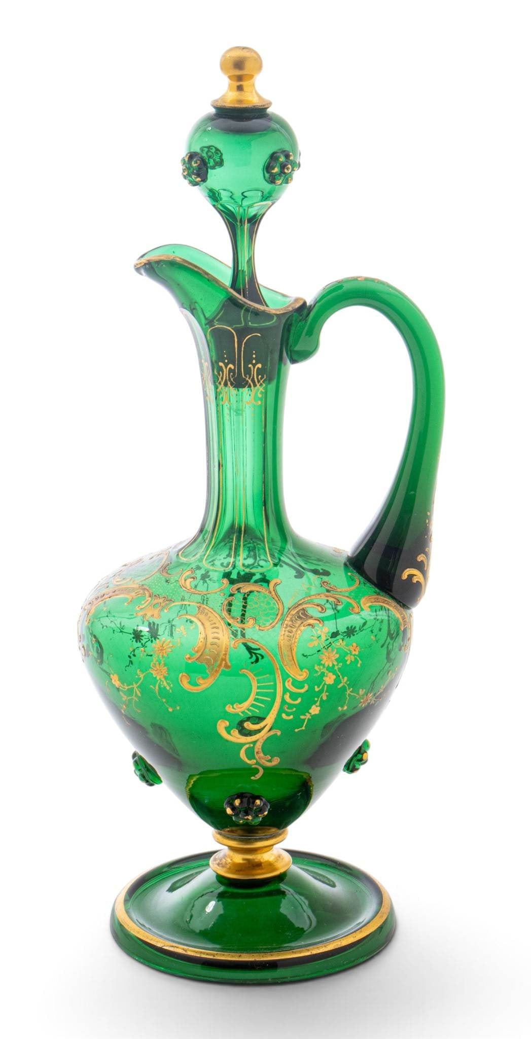Italian Venetian Green Glass Cruet 20th Cent., H 10.5" W 4" Depth 4.5": Italian Venetian Green Glass Cruet 20th Cent., H 10.5" W 4" Depth 4.5" Green glass with fired gold designs. Has blown glass stopper. No apparent marking. Dimensions: H 10.5" W 4" Depth 4.5"