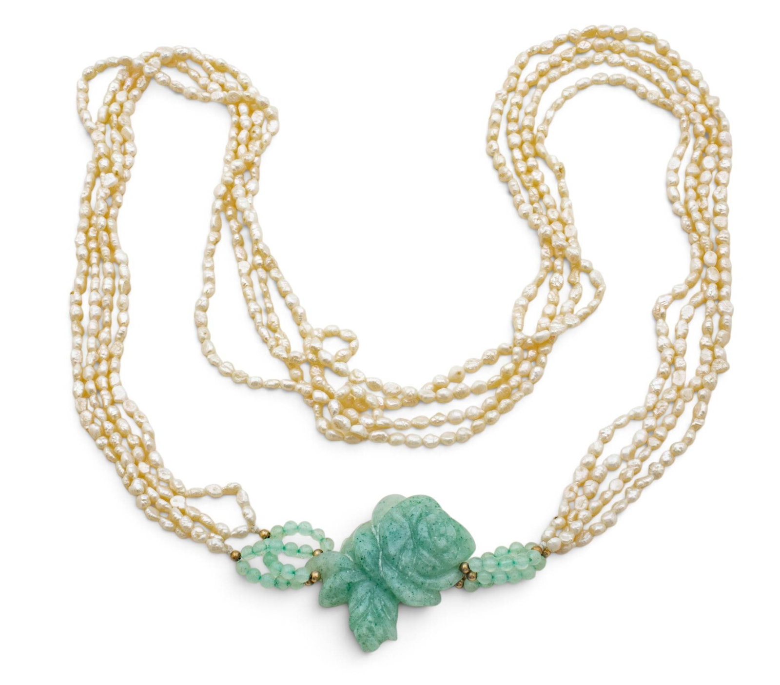 Seed Pearl and Carved Quartz Pendant Necklace 1960, L 32" 93 grams 1 PC: Seed Pearl and Carved Quartz Pendant Necklace 1960, L 32" 93 grams 1 PC Green quartz flower form pendant on four strand long seed pearl designer necklace. Provenance: Property from the estate co