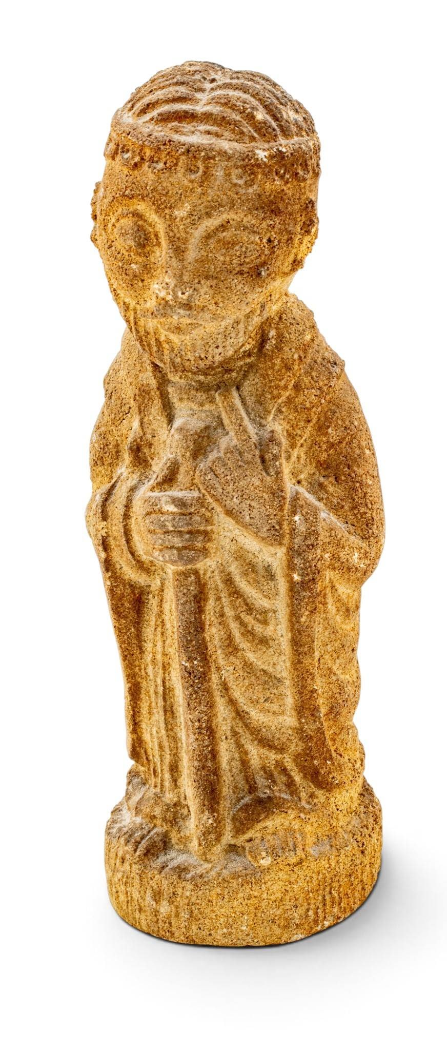Carved Sandstone Saint John the Baptist, Ca. 19th C., H 6.5" W 2.25" Depth 1.75" 1 PC: Carved Sandstone Saint John the Baptist, Ca. 19th C., H 6.5" W 2.25" Depth 1.75" 1 PC Depicting a bearded figure holding a staff in his left and hand and pointing his index finger with the other. 