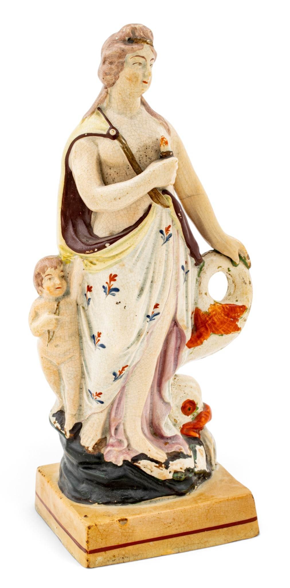 Staffordshire (English) Pearlware Figure of Venus, Ca. Early 19th C., H 8.75" W 4" Depth 3": Staffordshire (English) Pearlware Figure of Venus, Ca. Early 19th C., H 8.75" W 4" Depth 3" Depicting the figure Venus with child supported by dolphin. Provenance: Property from the Estate Colle