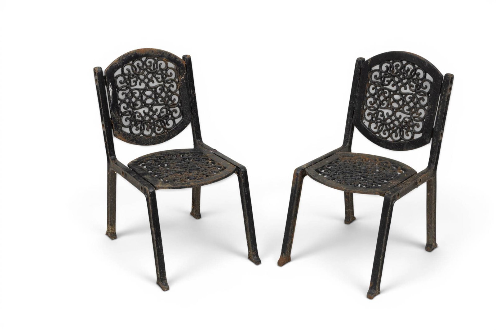 Cast Iron Child's Garden Chairs: Cast Iron Child's Garden Chairs Open arm. Provenance: Property from the estate collection of a prominent Grosse Pointe Farms, MI private collector. Dimensions: