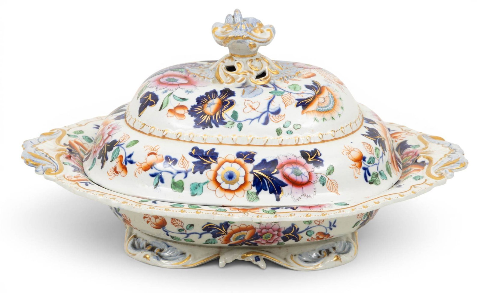 Ironstone China LIV Covered Tureen, Repaired 1850, H 8" W 10.5" L 13" 1 PC: Ironstone China LIV Covered Tureen, Repaired 1850, H 8" W 10.5" L 13" 1 PC Cobalt blue and pink flowers. Gilt gadroon edge. Maker's mark on base with unicorn and crown. Provenance: Property from the e