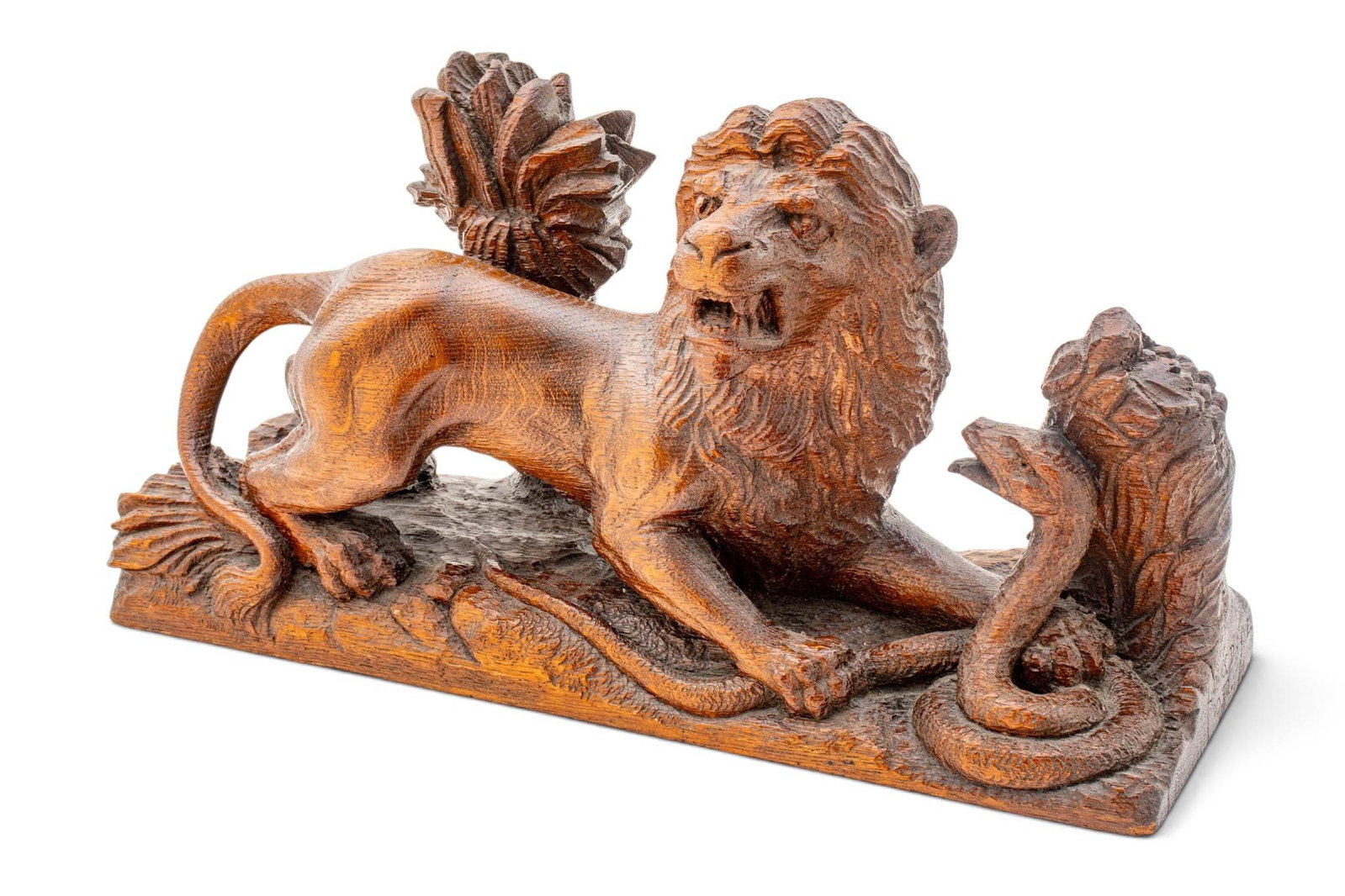 Louis Drake Carved Oak Sculpture, Ca. 1932, 'Lion and Snake', H 10.5" W 6.5" L 20.5": Louis Drake Carved Oak Sculpture, Ca. 1932, 'Lion and Snake', H 10.5" W 6.5" L 20.5" Depicting a fierce lion with his teeth bared and a snake ready to strike. Signed on base. Provenance: Propert