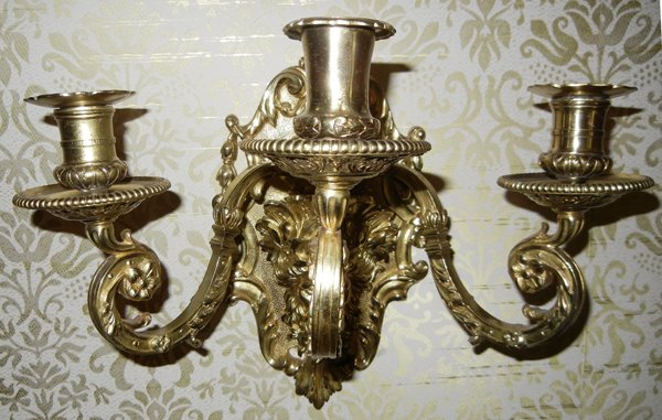 BRONZE PAIR OF THREE LIGHT SCONCES H 12", W 14": BRONZE PAIR OF THREE LIGHT SCONCES, H 12'', W 14'':Male mask at center with beard and crown-like head pieces. Three scroll and leaf arms, gadrooning at the edges of bobeches. Flower and bead design.