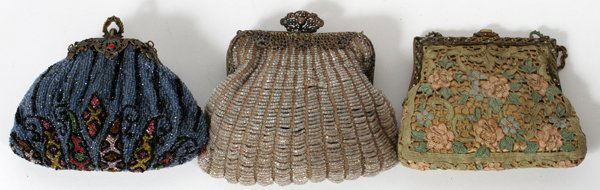 VINTAGE PURSES THREE C 1900: VINTAGE PURSES THREE C 1900:two are hand beaded. Third is fabric. Metal frames.