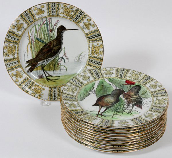ROYAL DOULTON GAME BIRD PLATES, C. 1905, 12: ROYAL DOULTON GAME BIRD PLATES, C. 1905, SET OF TWELVE, DIA 9 1/2", PATTERN #D 2071:Each is decorated at the well with waterfowl and game birds, dark green and golden yellow border with fired gold rim