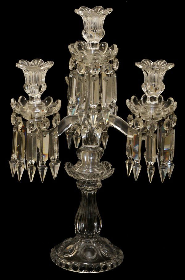 BACCARAT CRYSTAL THREE-LIGHT CANDELABRUM, H 18": BACCARAT CRYSTAL THREE-LIGHT CANDELABRUM, H 18'', W 11":Hung with crystal prisms. From a stately Grosse Pointe, Mich. Home.