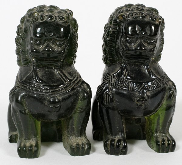 CHINESE GREEN GLASS FU DOGS, PAIR, H 4": CHINESE GREEN GLASS FU DOGS, PAIR, H 4":With stands. Estate of Christopher Seitz.