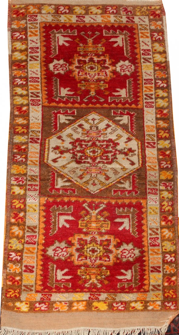 TURKISH ANATOLIAN TRIBAL MAT 37" X 18": TURKISH ANATOLIAN TRIBAL MAT 37" X 18":Antique, hand woven, wool and camel hair. Ivory, brown, red, hints of yellow.1'6" x 3'1". From the Estate of Charles Chevalier, Mt. Clemens, Michigan.