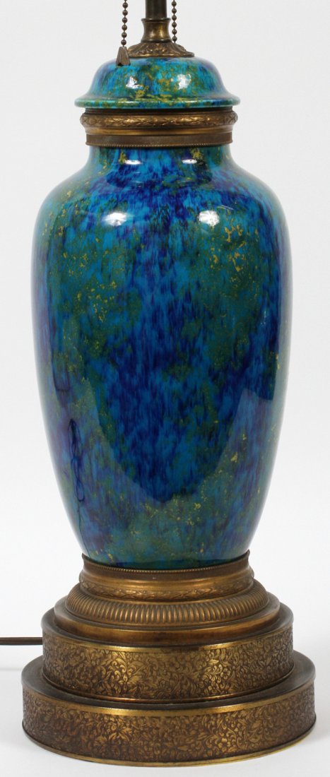 SEVRES STYLE PORCELAIN COVERED URN, AS A LAMP: SEVRES STYLE PORCELAIN COVERED URN ATTRIBUTED TO PAUL MILLET, H 12", MOUNTED AS A LAMP, 30" OVERALL:Mottled blue porcelain urn with cover and gilt bronze mounts, fitted on a gilt metal stepped lamp ba