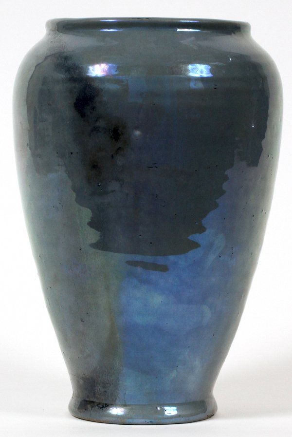 PEWABIC IRIDESCENT POTTERY VASE, H 8 1/4": PEWABIC IRIDESCENT POTTERY VASE, H 8 1/4", DIA 5 1/4":Round with tapering sides, gray to lavender glaze with iridescent sheen, impressed "Pewabic Detroit" at the underside with original paper label (s