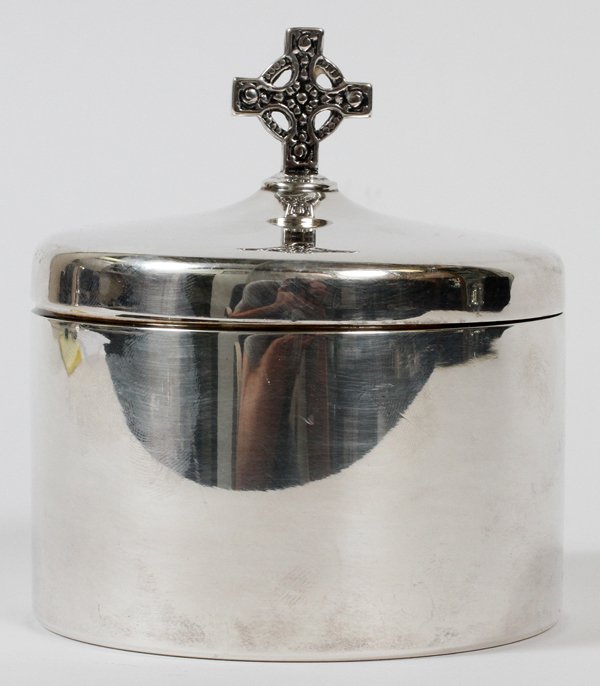BLACK, STARR & GORHAM STERLING BOX, H 3" DIA 4": BLACK, STARR & GORHAM STERLING BOX, H 3", DIA 4": A sterling silver cylindrical box, or pyx, with a cross finial centering the cover, gold wash interior. The base is stamped at the underside (see phot