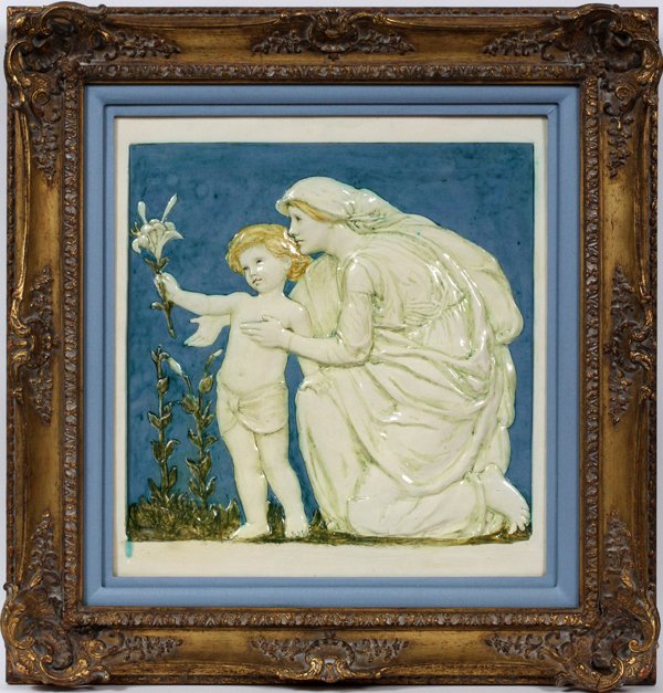 DELLA ROBBIA GLAZE POTTERY PLAQUE VIRGIN & CHILD: DELLA ROBBIA GLAZED POTTERY PLAQUE, 14" X 14", VIRGIN & CHILD:Depicts Virgin Mary and Child holding a lily. Inscribed on verso, #54 and dated 1904; gilt wood frame.