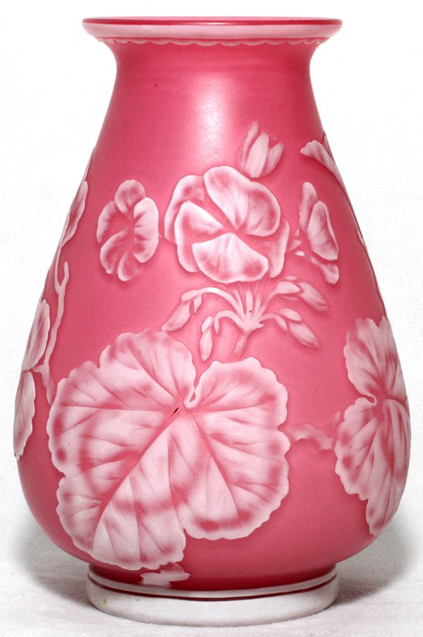 T. WEBB & SONS CAMEO GLASS EXHIBITION VASE 1889: THOMAS WEBB & SONS PINK CAMEO GLASS EXHIBITION VASE, PARIS, 1889, H 4 7/8":White cameo floral and leaf motif on a pink ground. Signed at the underside "Tiffany & Co., Paris Exhibition, 1889, Thomas We