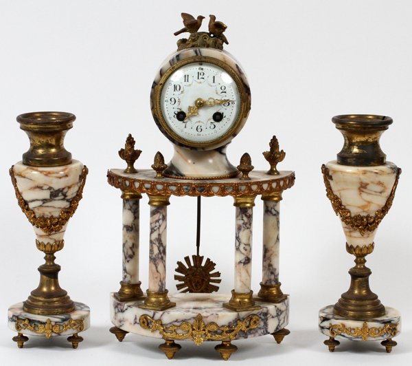 FRENCH MARBLE MANTEL CLOCK & PAIR OF URNS: FRENCH MARBLE MANTEL CLOCK & PAIR OF URNS, H 15":Including 1 mantel clock, H.15", W.8", and 2 urns, H.10" (lacking covers). Three items total. Made in France circa 1880. Attractive porcelain dial.