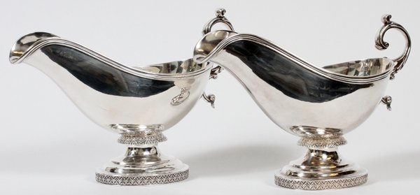 WM FORBES/TOMPKINS & BLACK SILVER SAUCE BOATS: WILLIAM FORBES FOR BALL, TOMPKINS & BLACK COIN SILVER SAUCE BOATS, NEW YORK, C. 1840, PAIR, L 10": Each is of elongated form with a threaded rim and scroll handle, raised on an oval base bordered by a