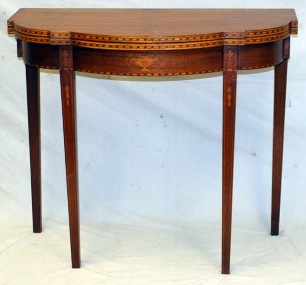 HEPPLEWHITE STYLE INLAID CONSOLE/CARD TABLE 1940: HEPPLEWHITE STYLE INLAID MAHOGANY CONSOLE/CARD TABLE, C. 1940, H 31", W 36", D 18":Satinwood inlay, bellflower and urn motif. Gate leg, raised on squared tapering legs. C. 1940, H 31", W 36", D 18"
