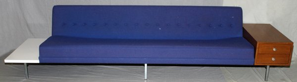 GEORGE NELSON FOR HERMAN MILLER CHROME SOFA: GEORGE NELSON DESIGNED FOR HERMAN MILLER CHROME PLATED STEEL SOFA, C. 1956, W 31" L 120":Fabric upholstered sofa with attached end table and 2 drawer cabinet.