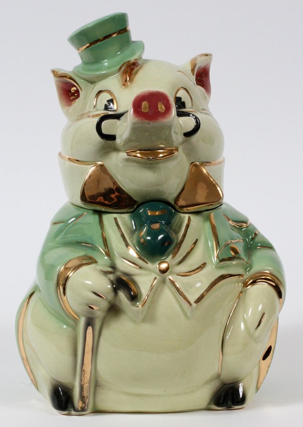 MCCOY HAND-PAINTED POTTERY PIG COOKIE JAR: MCCOY, HAND-PAINTED POTTERY, PIG COOKIE JAR, H 12":depict a pig with top had, coat, tie and fired gold cane, Beige, light green, mauve, with gold trim.