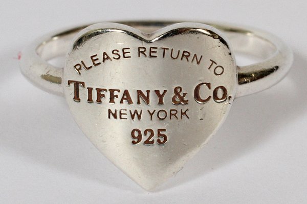 STERLING SILVER TIFFANY NY LADIES HEART RING: STERLING SILVER, TIFFANY, NY, LADIES HEART SHAPE RING, SIZE 7:inscribed: 'Please Return To Tiffany & Co. New York 925"; Sterling Silver 925; 0.09 Tr. Oz.