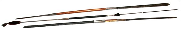 TANZANIAN MASAI WOOD AND METAL SPEARS: TANZANIAN MASAI WOOD AND METAL SPEARS, THREE, H 6' 6" - 7' 6":Having spear heads and back end spikes.
