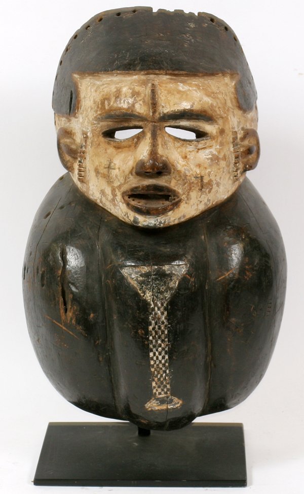 AFRICAN PUNU TRIBAL MASK: AFRICAN PUNU TRIBAL MASK, H 14" W 9": From the Punu tribe. Made up of two circle forms. The top circle being the face, which has two downward slanting eyes, and a puckered, semi-open mouth. The mask i