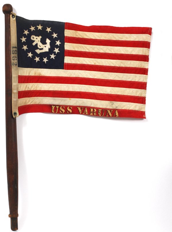 U.S.S VARUNA NAVAL FLAG ON WOODEN STAFF: "U.S.S VARUNA", NAVAL FLAG ON WOODEN STAFF, H 14'' X W 21'': Mark along the lower edge U.S.S Varuna. (USS Varuna (1861) was a heavy (1,300 ton) steam-powered ship, being build for civilian use, was ac