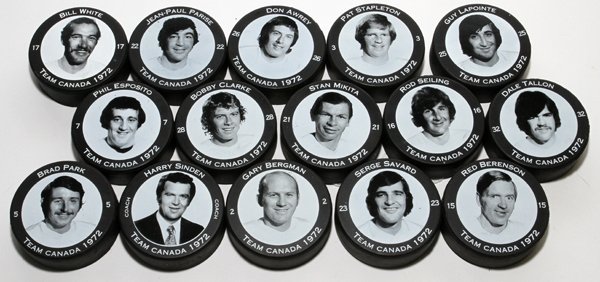 TEAM CANADA 1972 HOCKEY PUCKS COMMEMORATIVES: TEAM CANADA 1972, HOCKEY PUCKS, 'TEAM OF THE CENTURY' COMMEMORATIVES, 15 PCS.: unsigned commemorative pucks depicting Serge Savard, Stan Mikita, Rod Seiling, Phil Esposito, Bill White, Gary Bergman, G