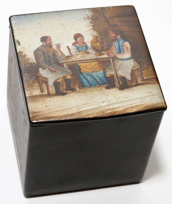 RUSSIAN LACQUER BOX LATE 19TH C.: RUSSIAN LACQUER BOX, LATE 19TH C., H 3 1/2" W 3 1/4":The hinged lid is decorated with a woman and two men seated at a table in an outdoor setting.