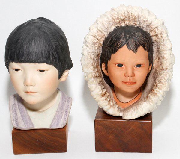 CYBIS BISQUE BUSTS 2 PIECES & 8: CYBIS BISQUE BUSTS, 2 PIECES, H 7 1/4" & 8":Depicting a Chinese child and an Inuit child. Both are signed. Raised on wooden bases.