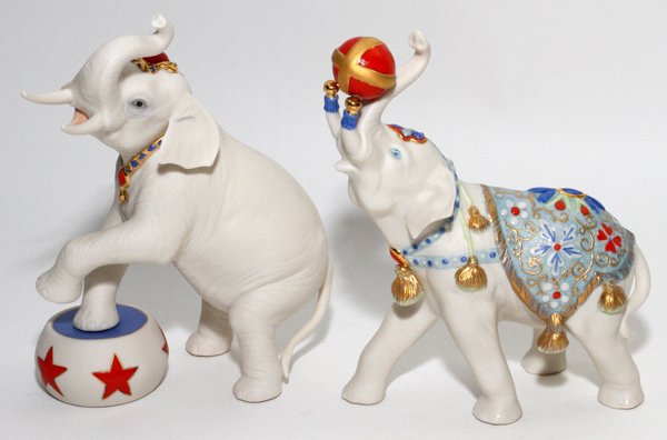 CYBIS BISQUE FIGURES OF ELEPHANTS 2 PIECES: CYBIS BISQUE FIGURES OF ELEPHANTS, 2 PIECES, H 7":Two circus elephants. Both signed at underside.