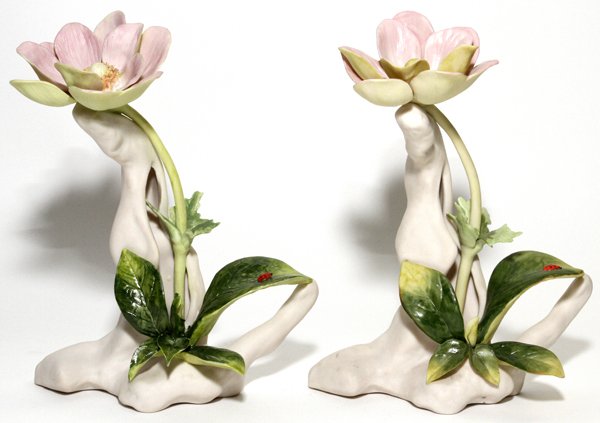 CYBIS BISQUE FLOWERS TWO: CYBIS BISQUE FLOWERS, TWO, H 8":Each is a pastel pink stem with green leaves and a red ladybug, signed.