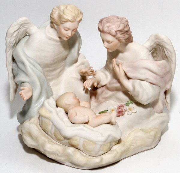 CYBIS BISQUE FIGURAL GROUPING: CYBIS BISQUE FIGURAL GROUPING, H 6", W 7 1/2":Sleeping Holy Child flanked by angels, signed.