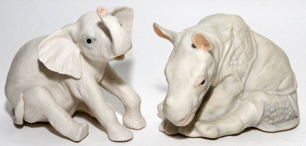 CYBIS BISQUE ANIMAL FIGURES 2 PIECES & 5: CYBIS BISQUE ANIMAL FIGURES, 2 PIECES, H 4" & 5":Includes one seated elephant, and one seated rhinoceros. Both signed at underside.