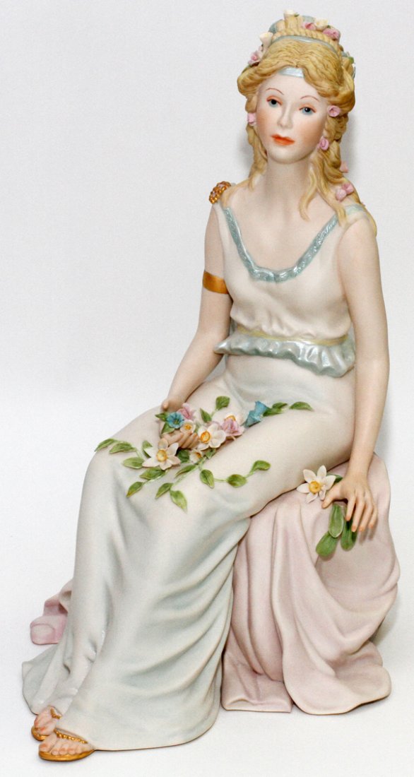 CYBIS BISQUE FIGURE OF SEATED WOMAN #115: CYBIS BISQUE FIGURE OF SEATED WOMAN, #115, H 14 1/2":Depicting seated woman in classical style attire. Signed and numbered at verso of base.