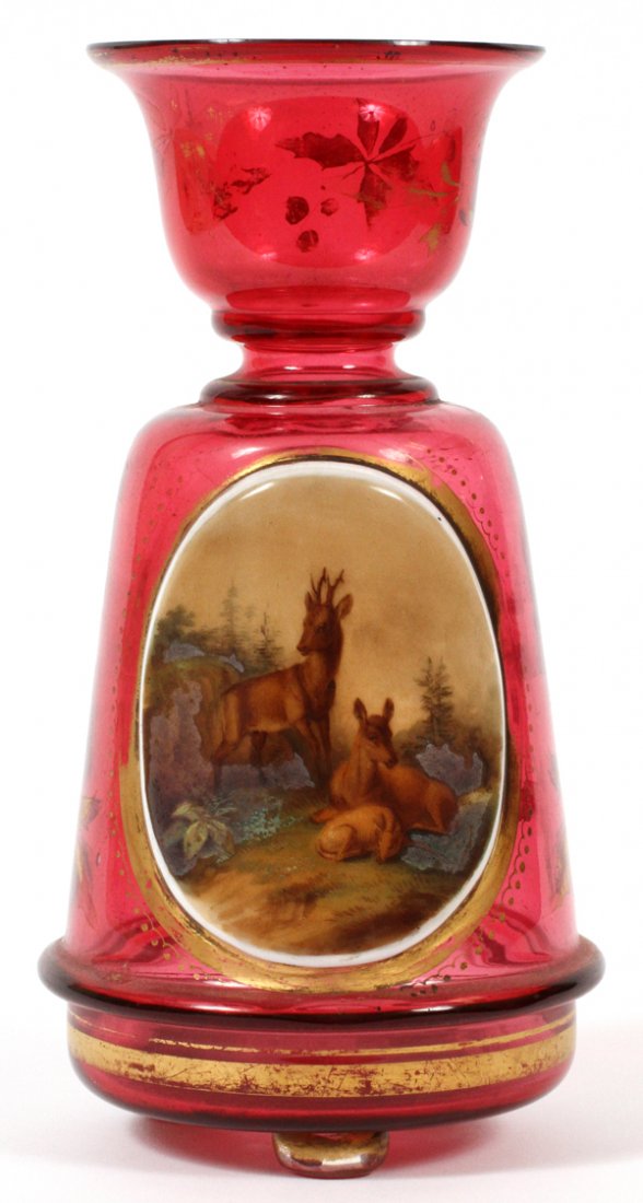 CRANBERRY GLASS VASE 19TH C.: CRANBERRY GLASS VASE, 19TH C.:Hand painted reserve with deer family; fired gold leaf decoration