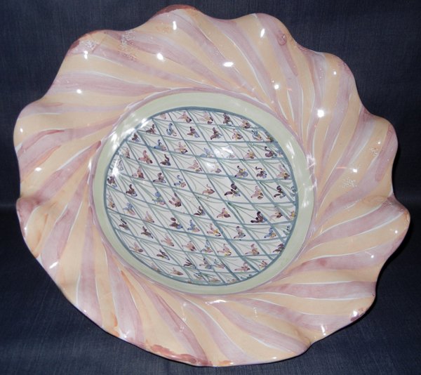 MCKENZIE CHILDS CENTERPIECE BOWL: MCKENZIE CHILDS CENTERPIECE BOWL, H 16", DIA 18":Purple, yellow, orange, salmon, green, blue and wine in color.