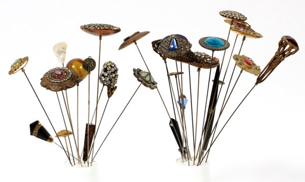 VINTAGE HAT PIN GROUPING LATE 19TH C. 32 PCS: VINTAGE HAT PIN GROUPING, LATE 19TH C., 32 PCS:Majority of grouping are Victorian and Edwardian hat pins. They range in size from 4 1/2" to 13" high.
