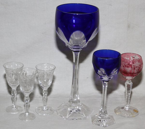 BLEIKRISTALL WEST GERMANY COLORED GLASSES LIQUOR: BLEIKRISTALL, WEST GERMANY, 3 COLORED GLASSES,3 LIQUOR, 6 TOTAL:includes three clear cut liquor glasses, 4" H.; two cut glass cobalt blue to clear glasses, one being a cordial and other a Rhine wine; 