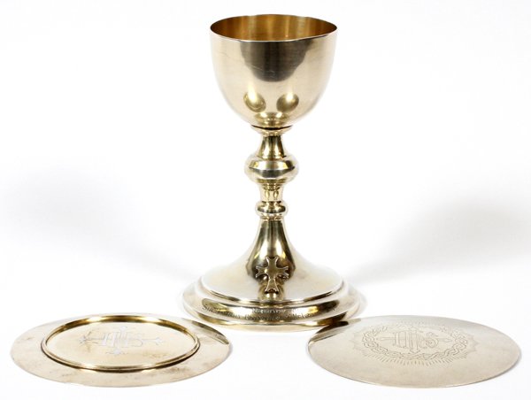 STERLING COMMUNION CHALICE W/ PATENS: STERLING COMMUNION CHALICE WITH PATENS, C. EARLY 20TH C., THREE PIECES, H 6 1/2":Stamped "925, Sterling" at underside. Raised on round base, with figures on neck depicting standing angels holding plaq