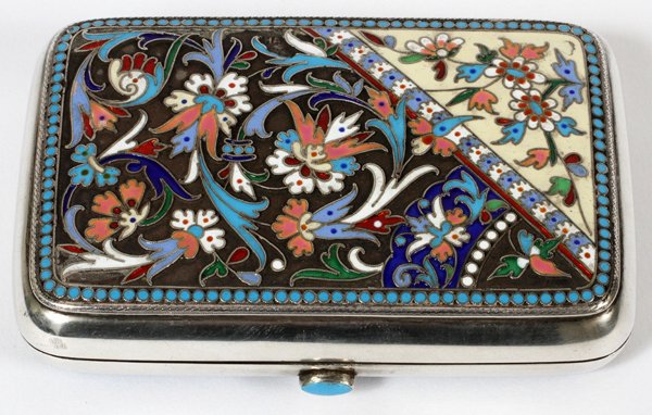 RUSSIAN SILVER & ENAMEL CIGARETTE CASE: RUSSIAN SILVER & ENAMEL CIGARETTE CASE, C. 1896-1908, L 3 3/4":The hinged sides decorated with brightly colored foliate scroll enamels, stamped with Kokoshnik indicating .875 fineness, and assayer's m