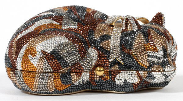 JUDITH LEIBER SLEEPING CAT MINAUDIERE: JUDITH LEIBER SLEEPING CAT MINAUDIERE, W 6 1/2":Full bead multicolor crystal sleeping cat with silver crystal bow, push button opens to two section interior with gold leather lining. Stamped: Judith L