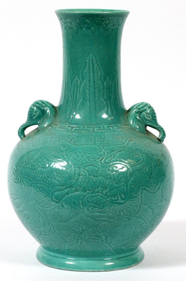 CHINESE CELADON PORCELAIN VASE: CHINESE CELADON PORCELAIN VASE, H 12":Having elephant head form handles at either side, decorated in dragon motif. Impressed leaf mark at underside. Measures H. 12" x 8".