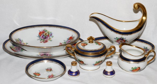 HUTSCHENREUTHER BAVARIAN PORCELAIN TABLE WARE: HUTSCHENREUTHER, BAVARIAN PORCELAIN TABLE WARE, 17 PIECES:Including 10 sauce dishes, 1 sauce boat, 1 vegetable bowl, L.10", 1 platter, L.12", 1 creamer, 1 covered sugar bowl, 1 individual salt shaker 