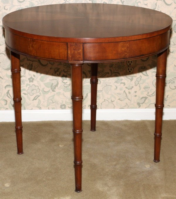 R. HONE FINE ARTS FURNITURE OF GRAND RAPIDS TABLE: R. HONE FINE ARTS FURNITURE OF GRAND RAPIDS TABLE, H 25", DIA 27":Round top raised on bamboo turned legs. Mahogany. Circa 1960.
