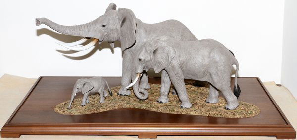 LOUIS PAUL JONAS STUDIOS GROUP ELEPHANTS ENCASED: LOUIS PAUL JONAS STUDIOS GROUP OF ELEPHANTS, H 18", W 37", ENCASED:Hand-painted composite group of three elephants, measuring H.13" x 28" x 17", limited edition #47/100, dated 2/97 (see additional pho
