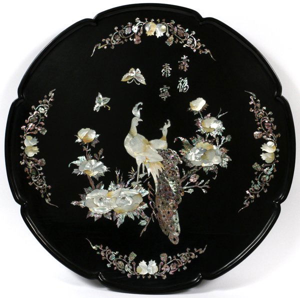 VINTAGE JAPANESE BLACK LACQUER WALL PLAQUE: VINTAGE JAPANESE BLACK LACQUER WALL PLAQUE, SIGNED, DIA 36" X 4" DEEP:converted table top made into a wall plaque consisting of Mother-of-Pearl Japanese peacocks, and floral detailing. Scrolled and ca